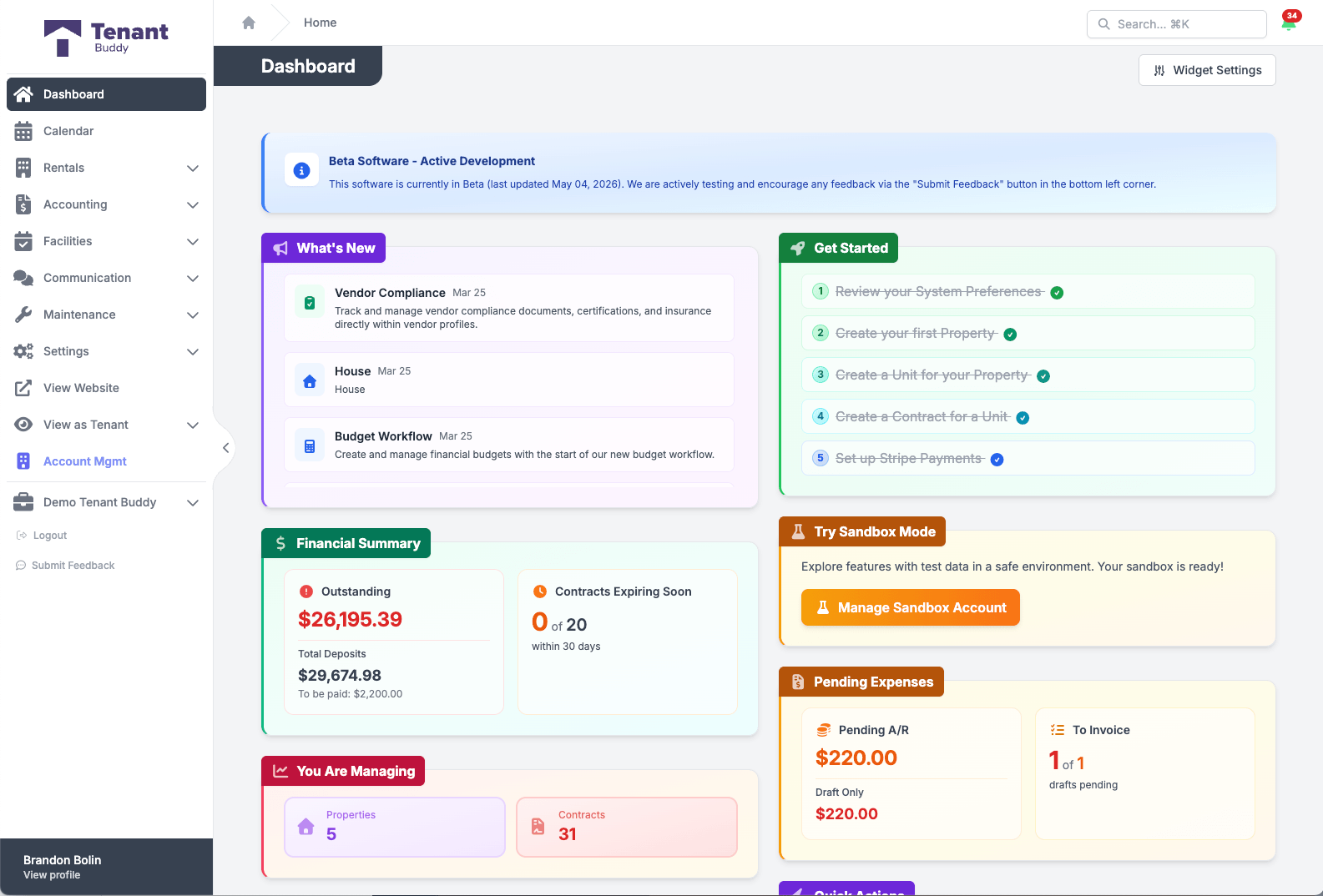 TenantBuddy main dashboard showing financial summary with outstanding invoices and deposits, contracts expiring soon, what's new updates, get started checklist, and pending expenses